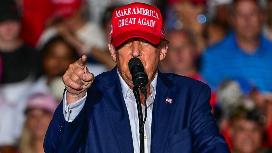 US President and Republican presidential candidate Donald Trump gestures as he speaks during a rally in Doral, Florida, on July 9, 2024.