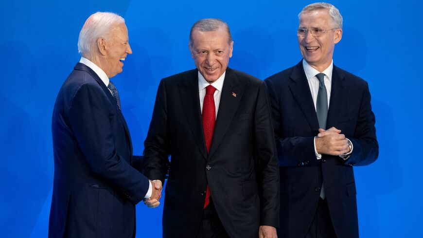 President Joe Biden and NATO Secretary General Jens Stoltenberg greet Turkish President Recep Tayyip Erdogan on stage before a group photo during the 2024 NATO summit on July 10, 2024, in Washington, DC. 