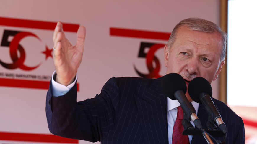 NICOSIA, CYPRUS - JULY 20: Turkish President Recep Tayyip Erdogan speaks during celebrations marking the 50th anniversary of Turkey's invasion of Cyprus on July 20, 2024 in occupied northern Nicosia, Cyprus. Fifty years has passed since Turkey's invasion and occupation of northern Cyprus, spurred in 1974 by Greece's attempts to oust the Cypriot president and forge a political union with the island. Over time, the northern part became the Turkish Republic of Northern Cyprus (TRNC), which is largely populated