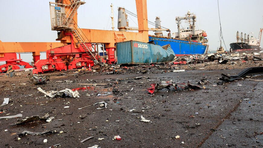 Debris litters a loading dock a day after Israeli strikes on the port of Yemen's Houthi-held city of Hodeida on July 21, 2024. 