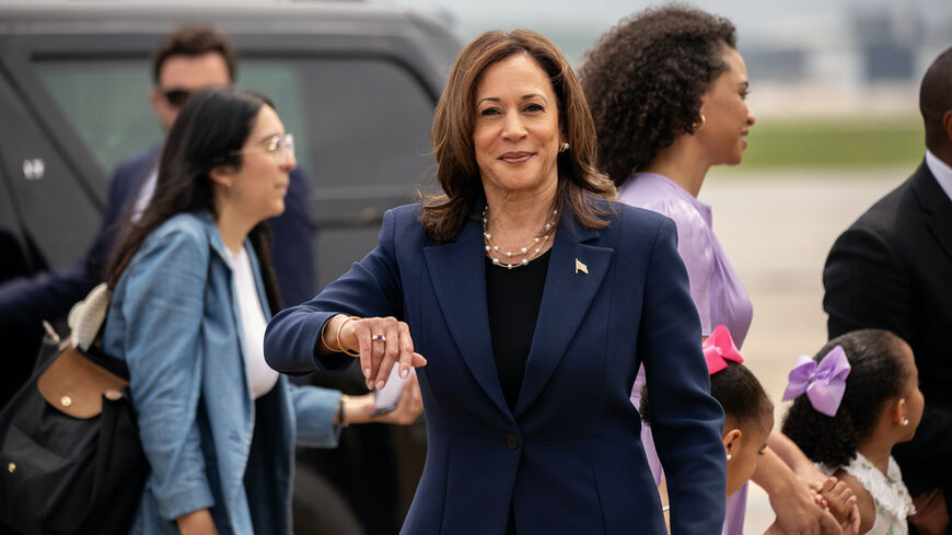 Democratic presidential candidate, US Vice President Kamala Harris, disembarks Air Force Two at the Milwaukee Mitchell International Airport on July 23, 2024 in Milwaukee, Wisconsin.