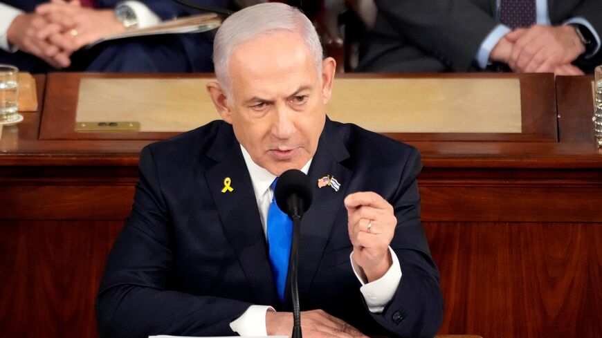  Israeli Prime Minister Benjamin Netanyahu addresses a joint meeting of Congress in the chamber of the House of Representatives at the U.S. Capitol on July 24, 2024, in Washington, DC.