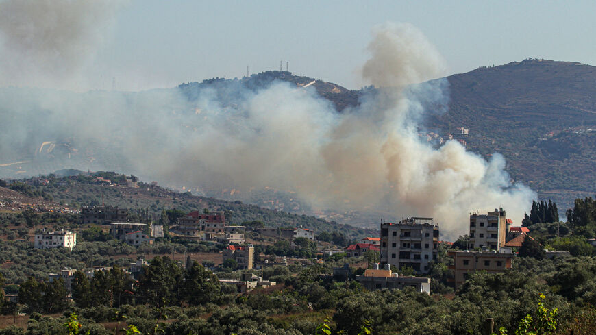 Smoke billows from a site targeted by the Israeli military in the southern Lebanese border village of Kafr Kila, amid ongoing cross-border clashes between Israeli troops and Hezbollah fighters, July 29, 2024.