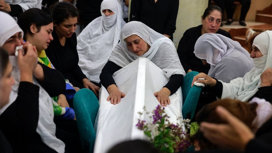 Druze mourners in Majdal Shams after deadly rocket fire at the Golan Heights town