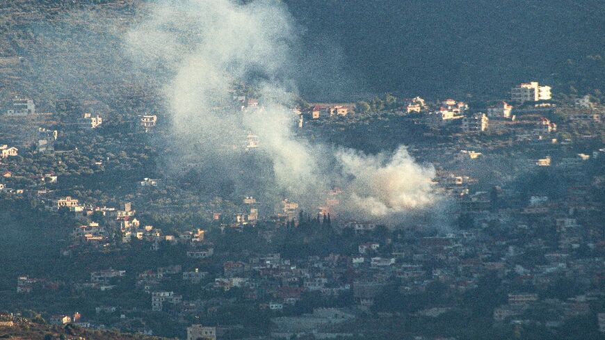 Smoke bilows following an Israeli strike in the village of Kfar Kila in southern Lebanon on July 16, 2024