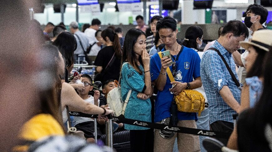 Passengers in airports around the world learned their flights had been delayed
