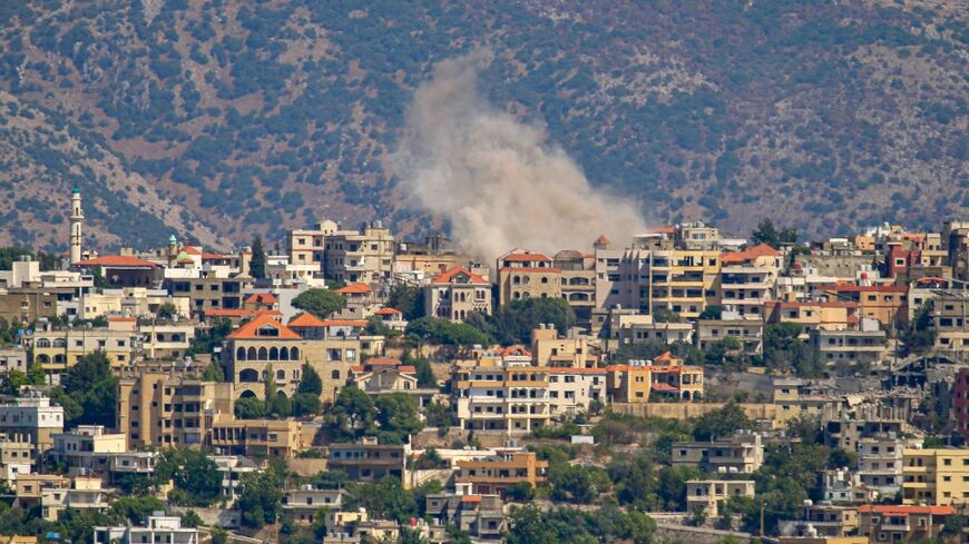 Smoke billows from a site targeted by Israeli shelling in the southern Lebanese border village of Khiam