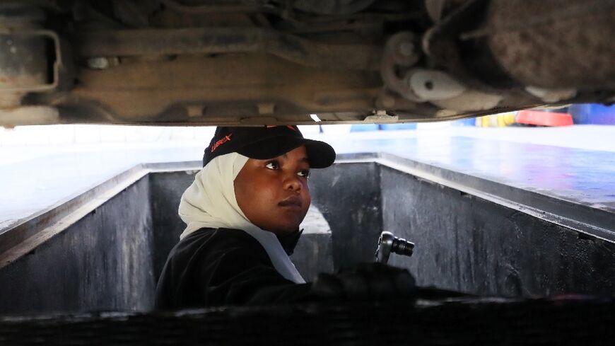 Asawar Mustafa fled the deadly violence of the war raging in her home country of Sudan, eventually arriving in Libya where she became a car mechanic