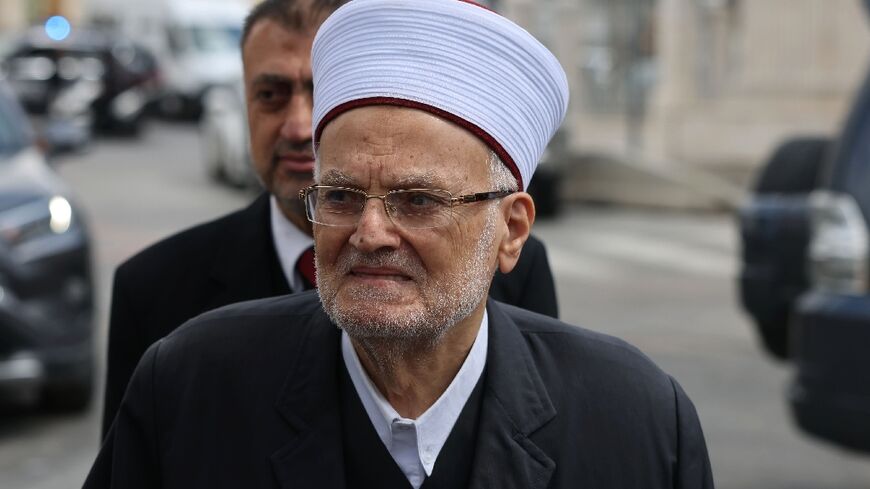 The former grand mufti of Jerusalem, Sheikh Ekrema Sabri, 85, arrives for questioning by Israeli police in May over a previous sermon he gave at the flashpoint Al-Aqsa Mosque