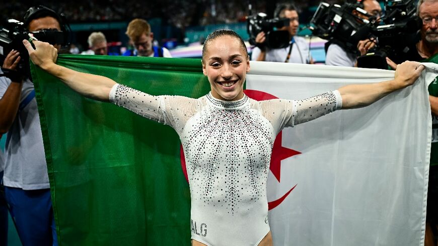 Algeria's Kaylia Nemour celebrates after winning gold