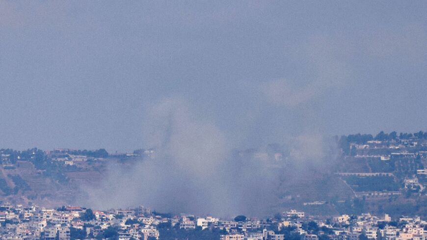 Some billows over the south Lebanon village of Khiam after an Israeli bombardment