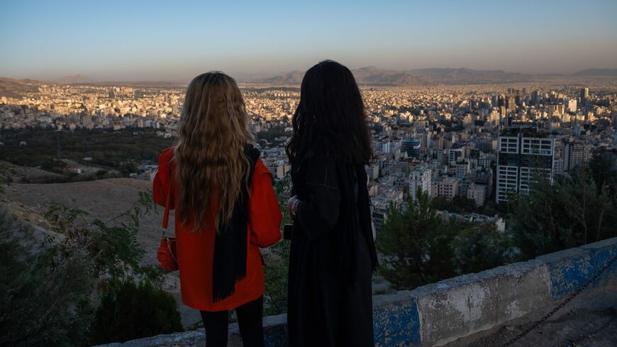 Two young Iranian girls, not wearing the mandatory hijab, visit Bame Tehran on Sept. 9, 2023.