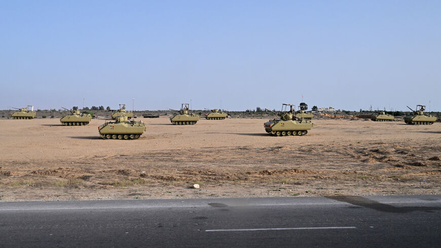 Egyptian army vehicles are deployed along the border with the Gaza Strip on July 4, 2024 in el-Arish, in the north Sinai Peninsula, amid continuing battles between Hamas and Israel in Palestinian besieged territory. (Photo by AFP) (Photo by -/AFP via Getty Images)