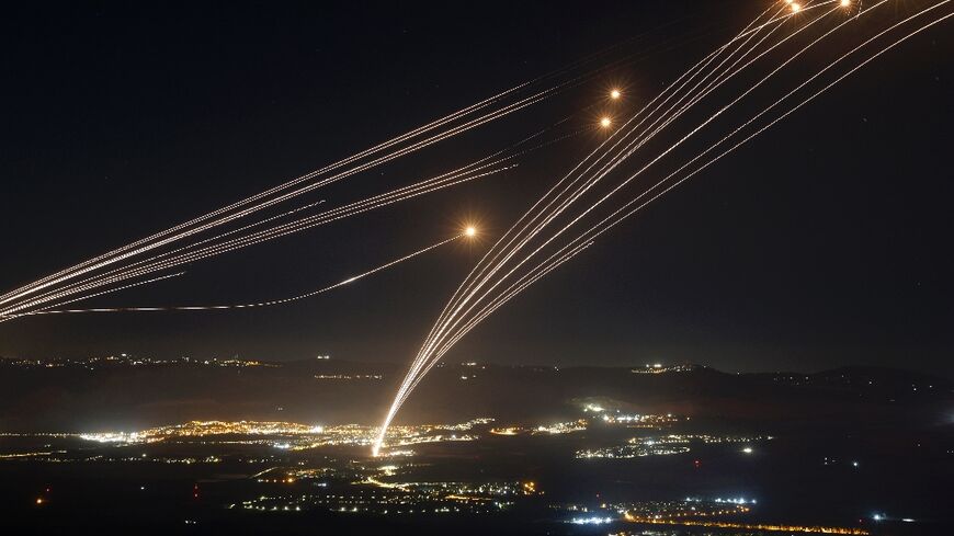 Rockets fired from southern Lebanon are intercepted by Israeli air defences