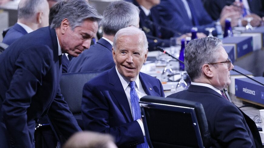 US President Joe Biden speaks with US Secretary of State Antony Blinken during the NATO summit in Washington in July 2024
