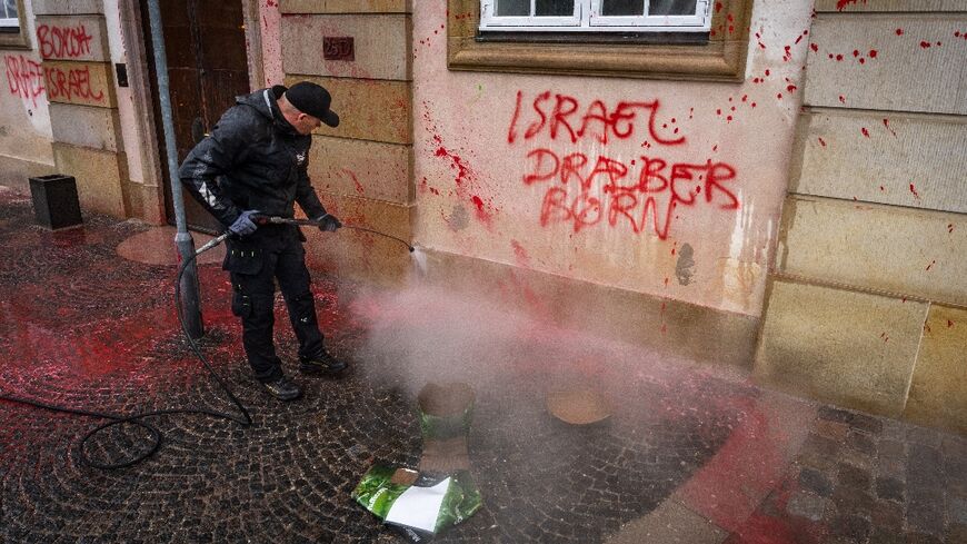 Red paint and anti-Israel slogans were spreayed on the Danish foreign ministry building in Copenhagen