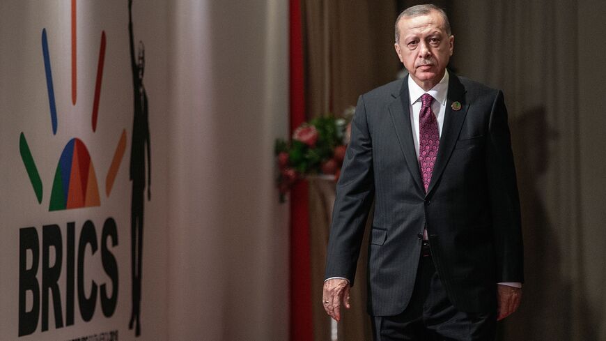 Turkey's president, Recep Tayyip Erdogan, arrives to attend a session meeting during the 10th BRICS summit on July 27, 2018 in Johannesburg, South Africa.