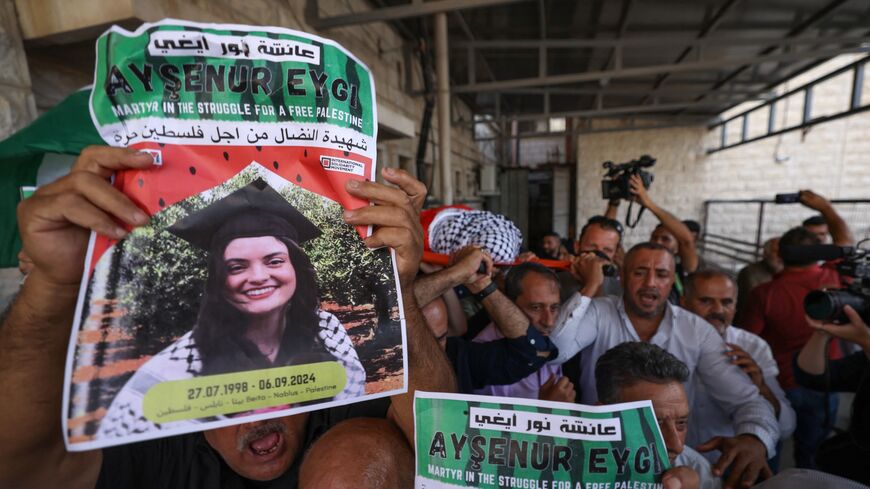 Palestinians carry the body of slain Turkish-American Aysenur Ezgi Eygi, an  International Solidarity Movement activist, during a funeral procession in Nablus in the occupied West Bank on Sept. 9, 2024.