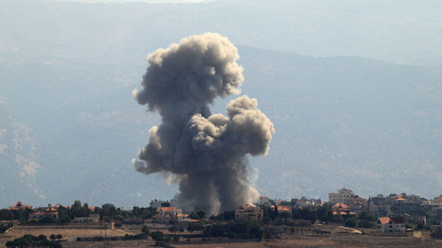 LEBANON-ISRAEL-PALESTINIAN-CONFLICT Smoke rises from the site of an Israeli airstrike that targeted the southern Lebanese village of Khiam on September 30, 2024. (Photo by Rabih DAHER / AFP) (Photo by RABIH DAHER/AFP via Getty Images)