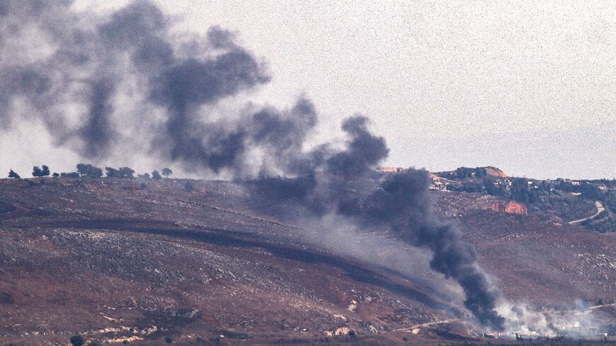 Smoke billows from the sites of an Israeli air strike in Lebanon's southern plain of Marjeyoun