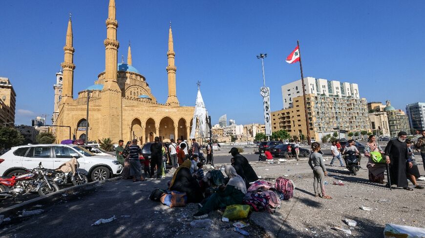 Many families who fled the southern suburbs spent the night in Beirut's Martyrs' Square