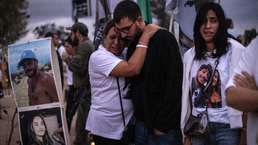 Fighting in the nearby Gaza Strip was audible in kibbutz Reim, where Israelis had gathered to mark one year since the Hamas attack of October 7