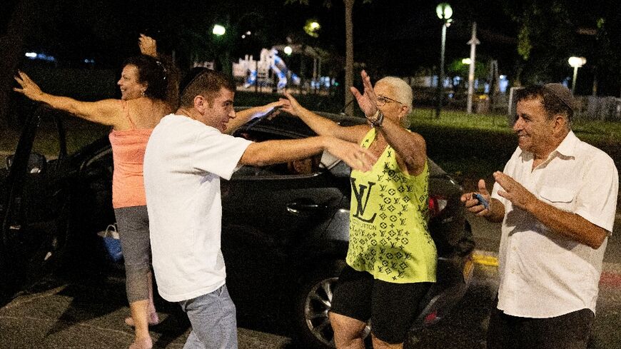 People in Tel Aviv, Israel, celebrate the killing of Hamas leader Yahya Sinwar