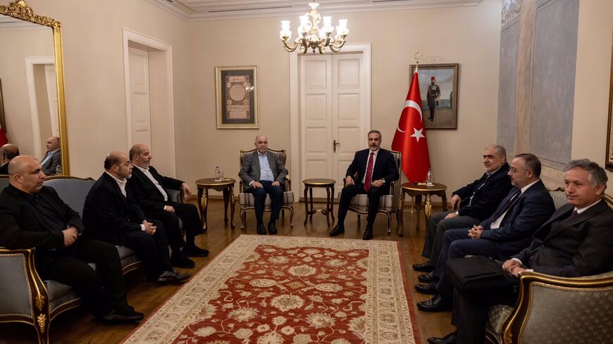 Turkey’s Foreign Minister Hakan Fidan (center right) met with Hamas political leaders, including Shura Council head Mohammad Darwish (center left), in Istanbul on Oct. 18, 2024.