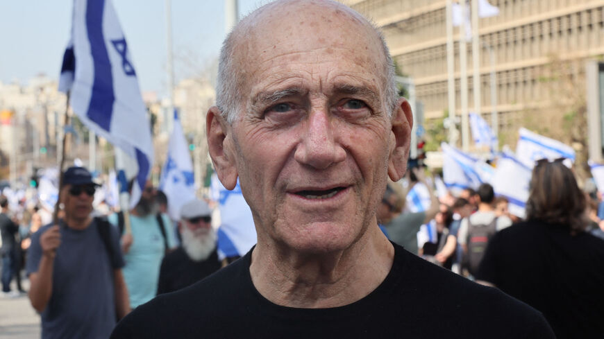 Former Israeli prime minister Ehud Olmert attends a demonstration against the Israeli government's controversial justice reform bill, in Tel Aviv on March 1, 2023. (Photo by JACK GUEZ / AFP) (Photo by JACK GUEZ/AFP via Getty Images)