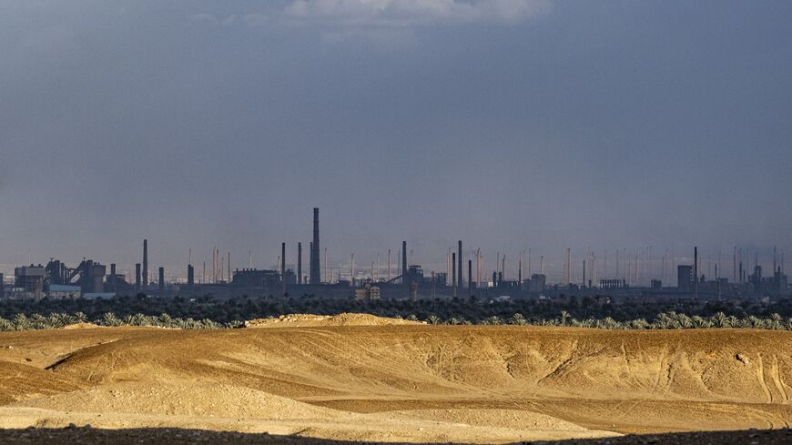 This picture taken on Feb. 6, 2023, shows a view of the Tibbin dual fuel (natural gas and fuel oil) powerplant and Helwan Steelworks, in the Helwan suburb south of Egypt's capital, Cairo.