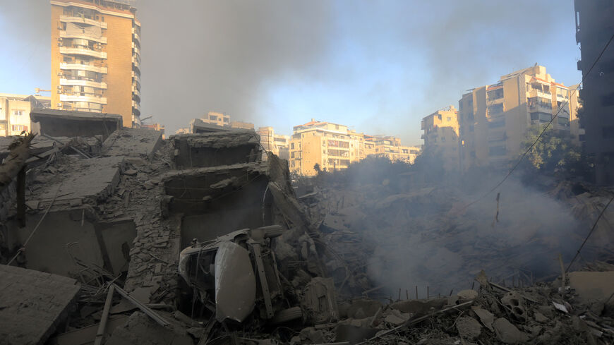 Smoke rises from buildings hit in an overnight Israeli airstrike that targeted the neighbourhood of Al-Jamous in Beirut's southern suburbs on October 3, 2024. Israel kept up its bombardment of Beirut after Iran launched its second, and largest, attack on Israel in months, which prompted Prime Minister Benjamin Netanyahu to warn Tehran would pay. (Photo by AFP) (Photo by -/AFP via Getty Images)