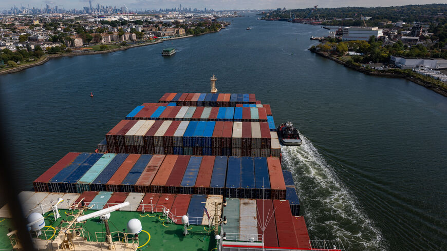 NEW YORK, NEW YORK - SEPTEMBER 30: A container ship departs the Port of Newark for the Atlantic Ocean on September 30, 2024 seen from New York City. A massive strike that could shut down ports across the East and Gulf coasts could begin at midnight as members of the International Longshoremen’s Association continue to make salary and other demands to the United States Maritime Alliance, which controls many of the ports across the country. (Photo by Spencer Platt/Getty Images)