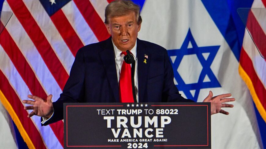 Former US President and Republican presidential candidate Donald Trump speaks at a remembrance event to mark the first anniversary of the Hamas attack on Israel at Trump National Doral golf club in Miami, Florida, on Oct. 7, 2024. 