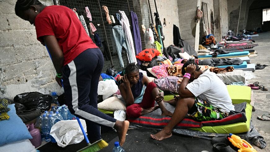 Many of the migrant workers sheltering in the Beirut warehouse are unable to leave as they 'don't have their passports', a volunteer says