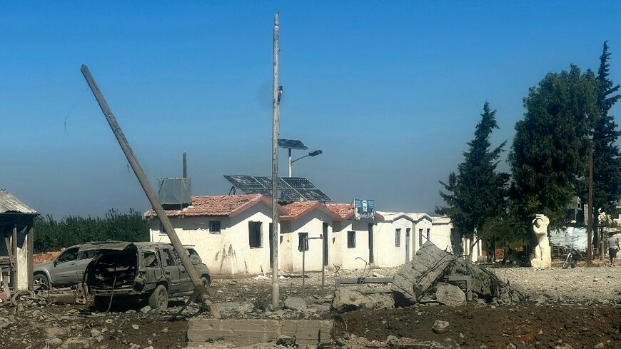 Damage seen from Qaa, Lebanon, on September 26, 2024 on the Syrian side of the Matraba crossing between Lebanon and Syria