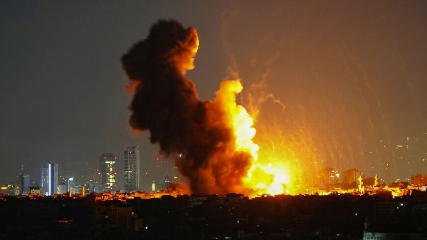 Smoke rises from the site of an Israeli airstrike that targeted a residential complex in the Laylaki neighbourhood in Beirut's southern suburbs