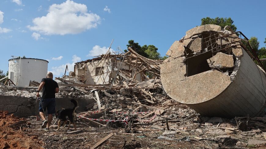 Rubble in a central Israeli city in the aftermath of the Iranian missile attack, Tehran's second-ever direct strike on its regional foe