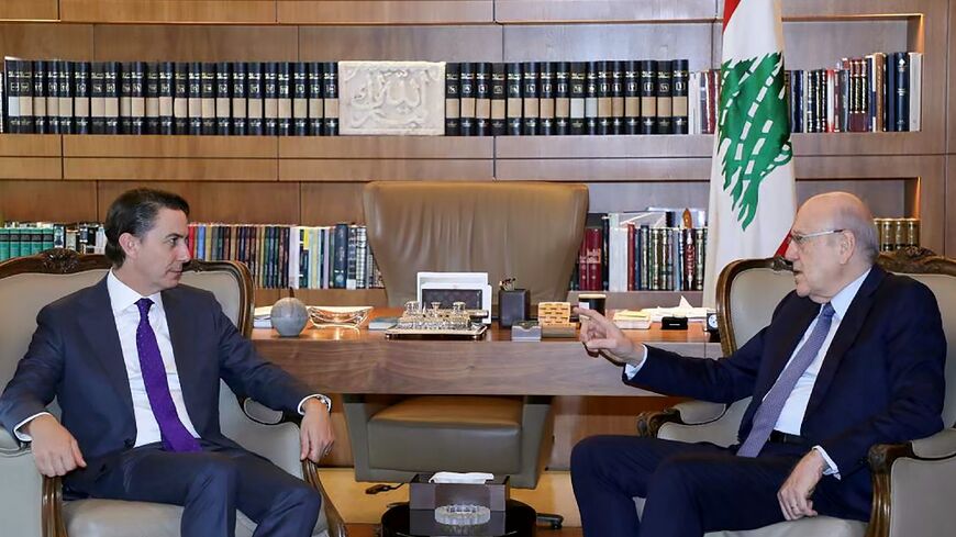 A handout picture provided by the Lebanese Prime Minister's press office shows Lebanese Prime Minister Najib Mikati meeting with US special envoy Amos Hochstein in Beirut