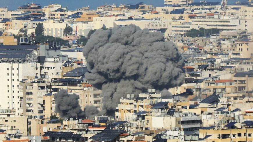 Smoke rises from the site of an Israeli air strike that targeted the Haret Hreik area of Beirut's southern suburbs