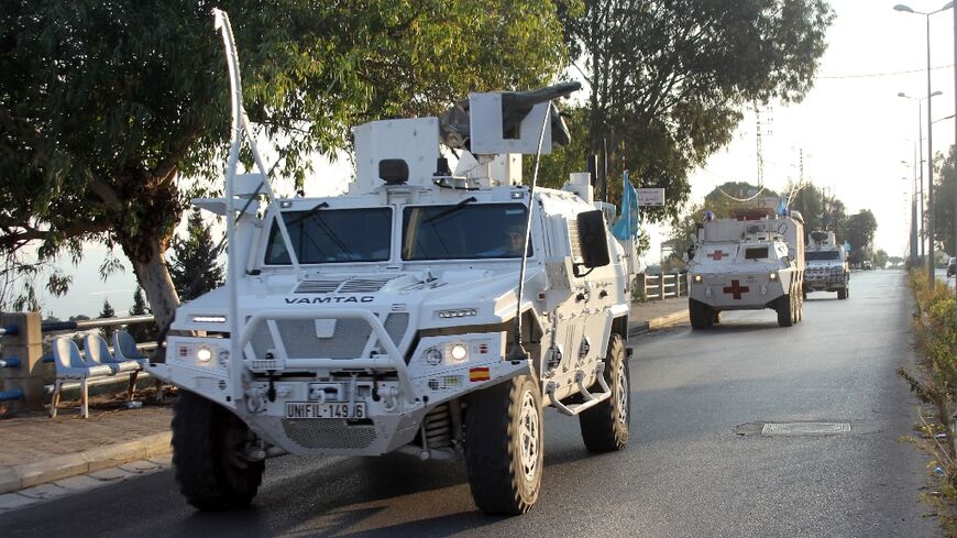 UNIFIL peacekeepers in the Marjayoun area of southern Lebanon accompany Lebanese Red Cross ambulances during the war between Israel and Hezbollah