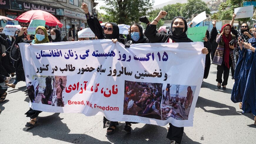 Afghan women protest the Taliban excluding girls from school and women from public life