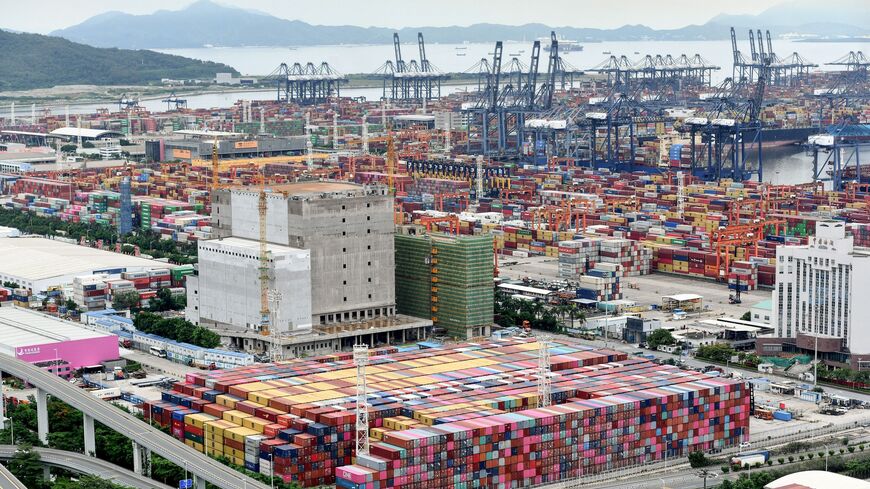 This aerial photo taken on June 22, 2021, shows cargo containers stacked at Yantian port in Shenzhen in China's southern Guangdong province. 