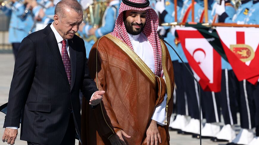 Turkey's President Recep Tayyip Erdogan (L) gestures as he welcomes Crown Prince of Saudi Arabia Mohammed bin Salman (R) during an official ceremony at the Presidential Complex in Ankara, on June 22, 2022. - Saudi Arabia's de facto ruler took a big step out of international isolation on June 22, 2022, paying his first visit to Sunni rival Turkey since the 2018 murder of journalist Jamal Khashoggi in the kingdom's Istanbul consulate. (Photo by Adem ALTAN / AFP) (Photo by ADEM ALTAN/AFP via Getty Images)