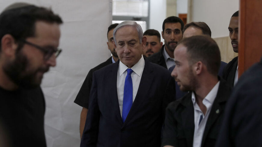 Israel's Prime Minister Benjamin Netanyahu arrives at the District Court to follow Hollywood producer Arnon Milchan by video conference from Brighton, testifying at a trial involving Netanyahu, Jerusalem, June 25, 2023.