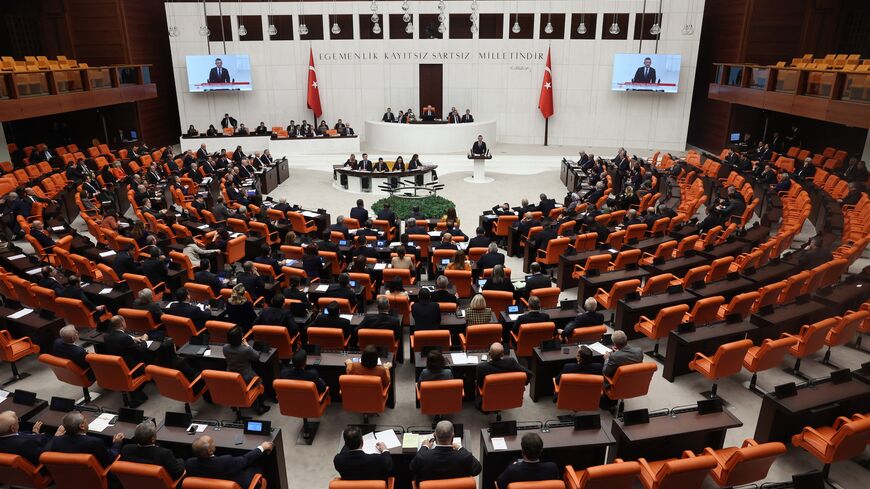 Turkish members of parliament attend a session at the General Assembly of the Turkish Grand National Assembly, in Ankara, on Dec. 11, 2023. 