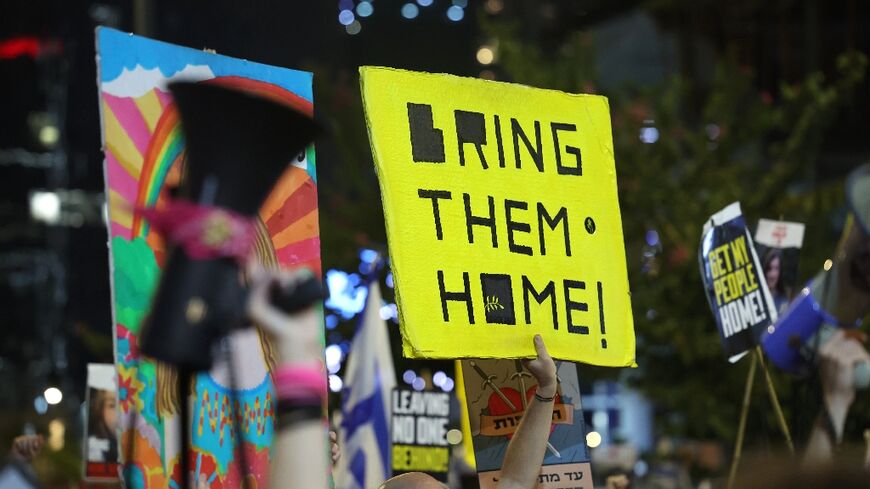 Hundreds of Israelis demonstrate in commercial hub Tel Aviv for a truce deal to bring the remaining hoistages home from Gaza