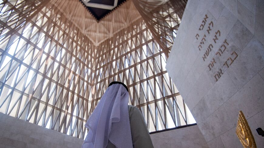 A visitor at the UAE's first official synagogue, opened within an interfaith centre in Abu Dhabi last year