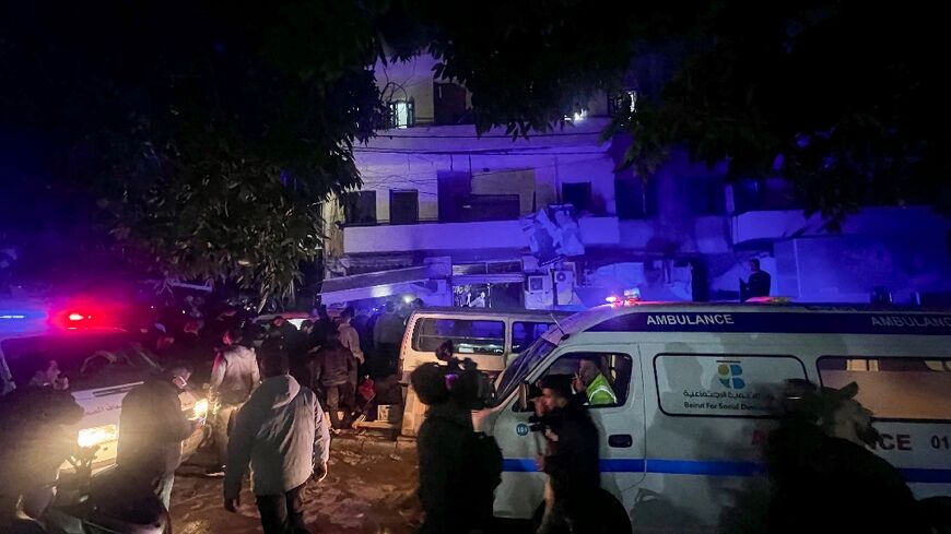 Ambulances and police at the scene of an Israeli strike that targeted Zuqaq al-Blat neighbourhood in Beirut, killing five people according to Lebanon's health ministry