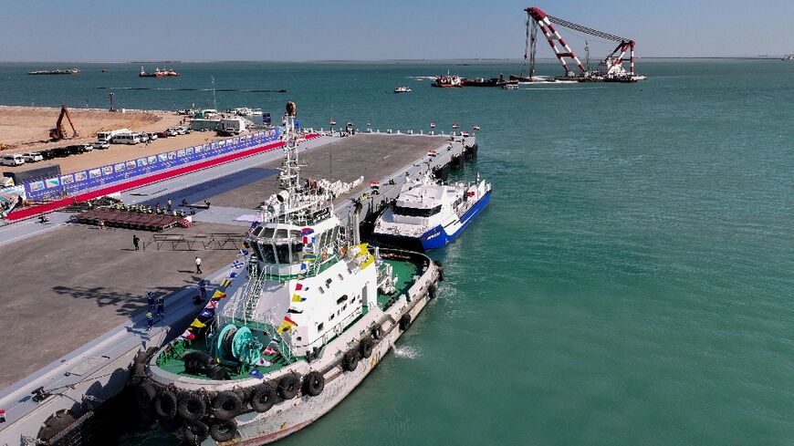 Boats sit at mooring at a newly inaugurated dock in Grand Faw Port, a multi-billion dollar mega-project on Iraq's Gulf coast.