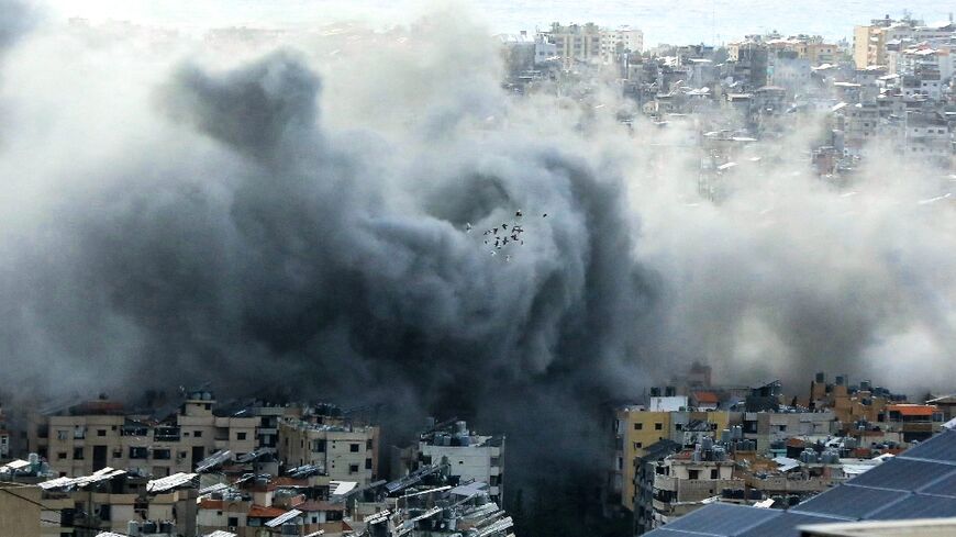 Smoke rises from the site of an Israeli air strike in Beirut's southern suburbs